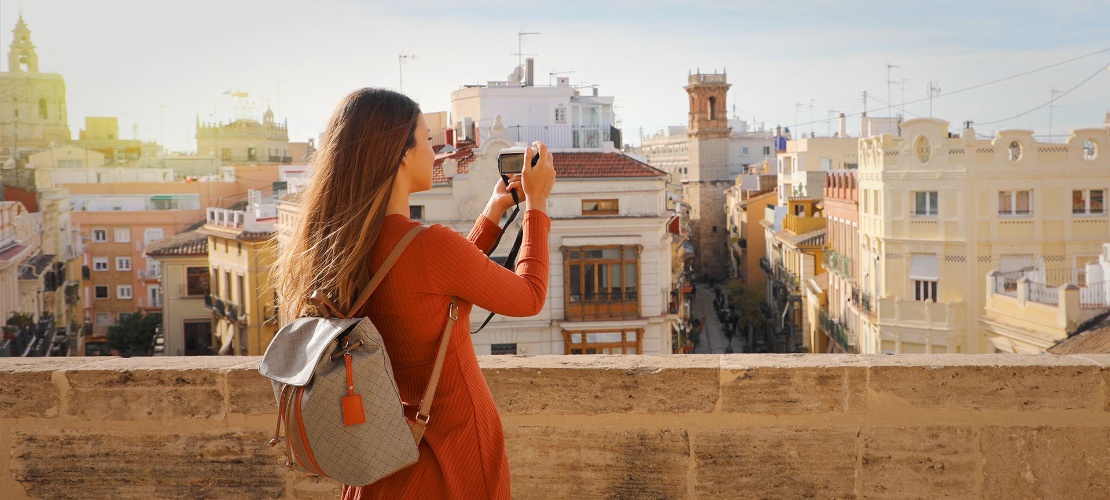 Tourist taking a photo of Valencia